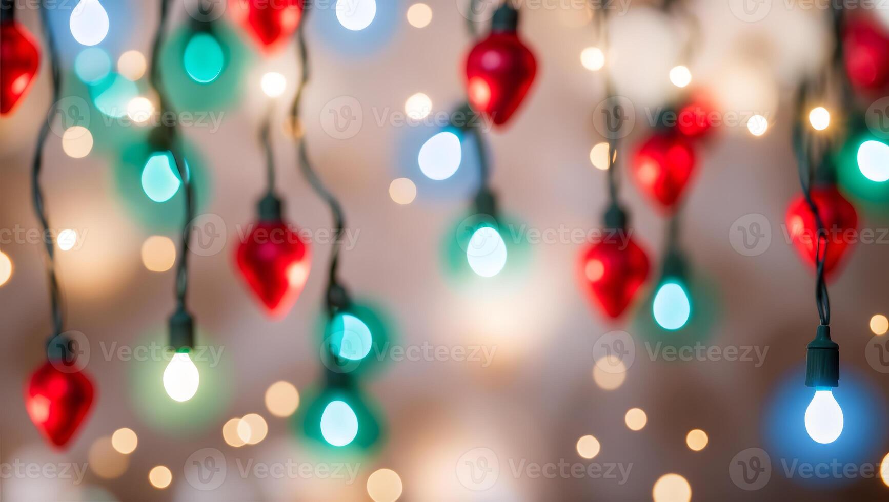 Christmas lights are hanging from a string photo