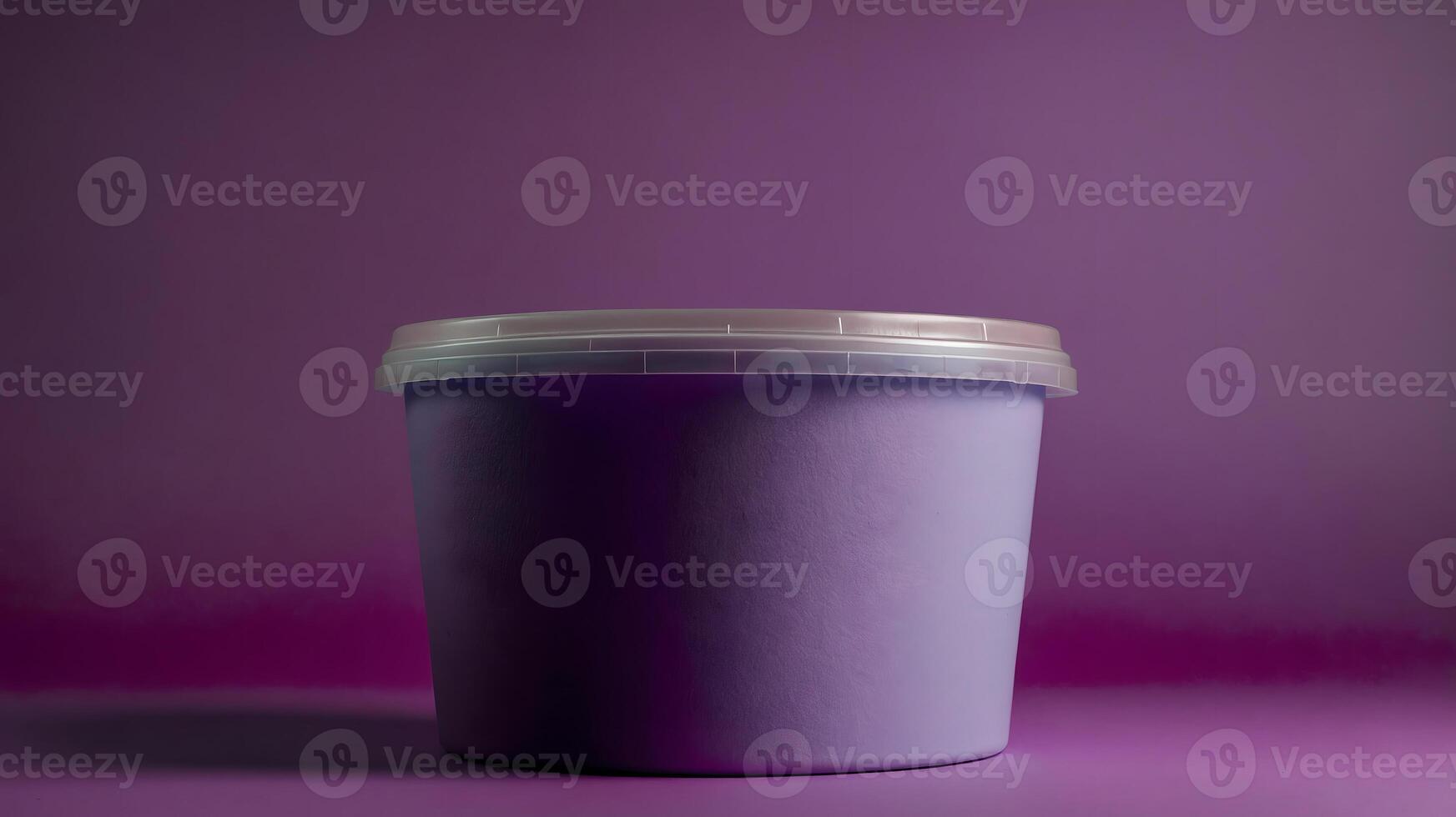 A purple plastic container on a purple background photo