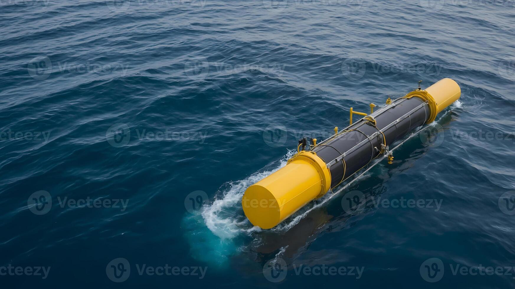A yellow submarine floating in the ocean photo