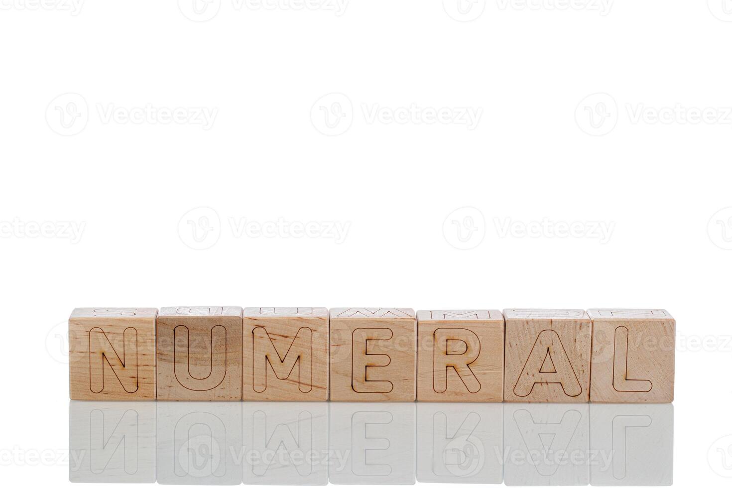Wooden cubes with letters numeral on a white background photo