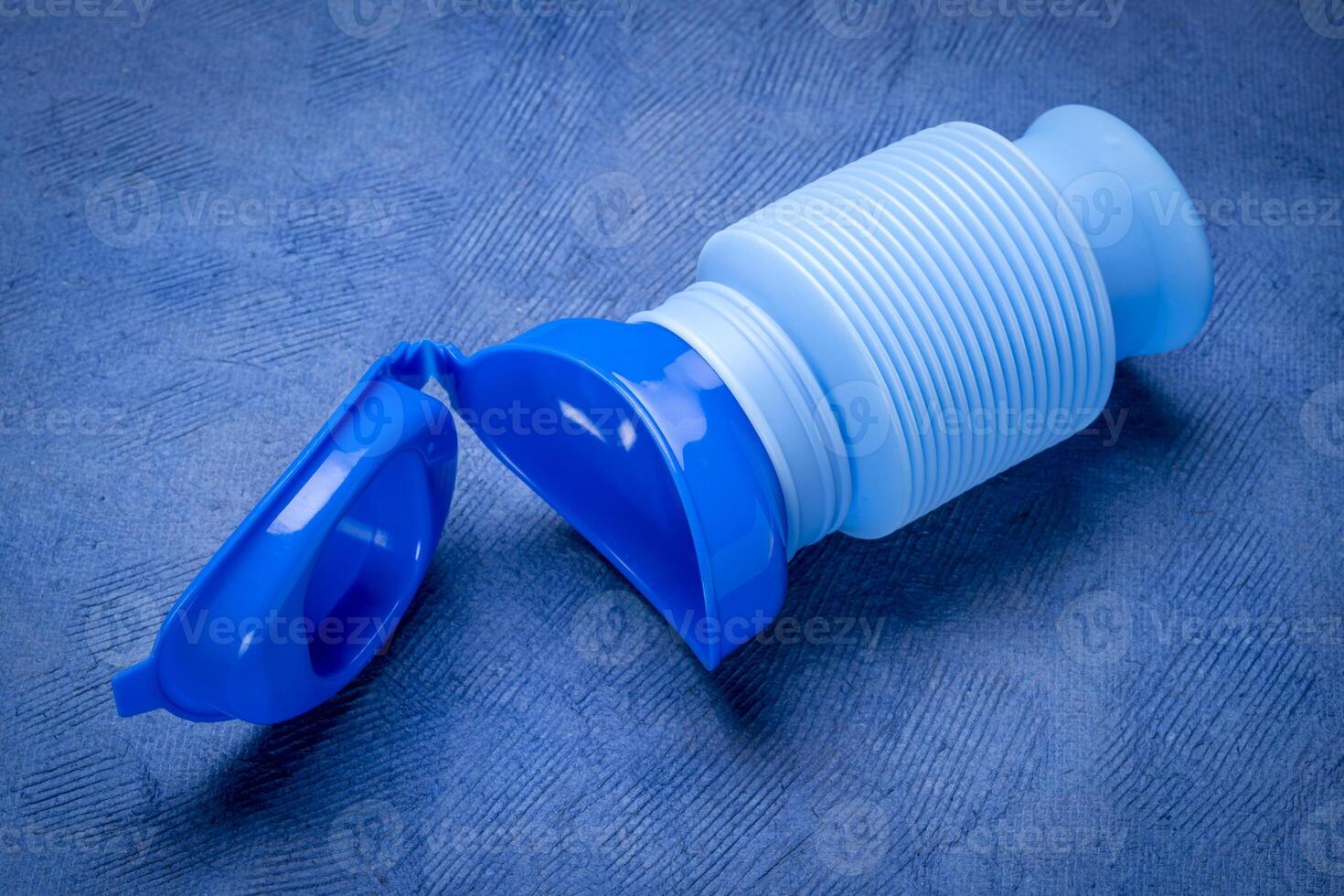 adjustable, collapsible, portable urinal for men and women for travel and emergency photo