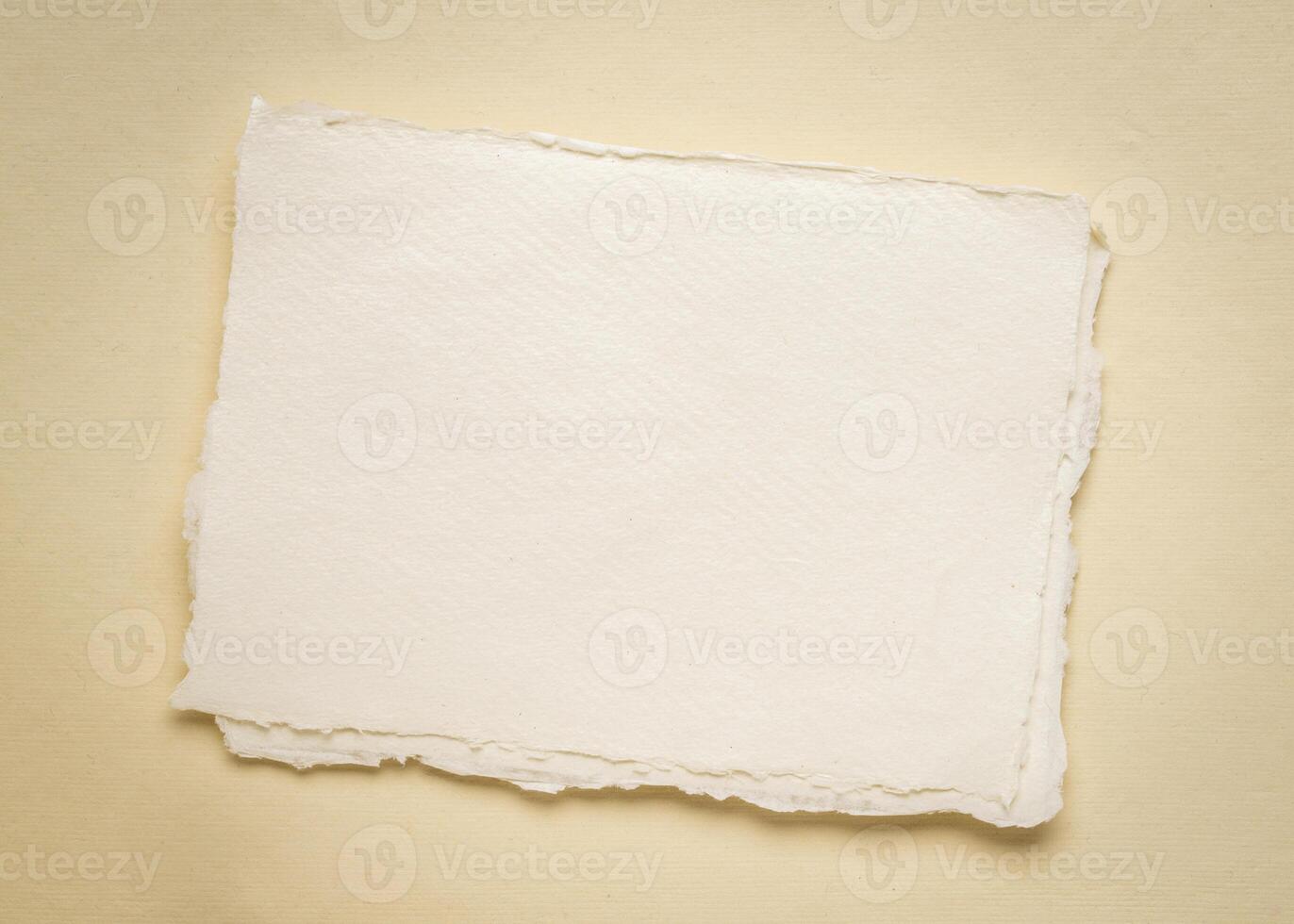 small blank sheet of watercolor paper on an art paper photo