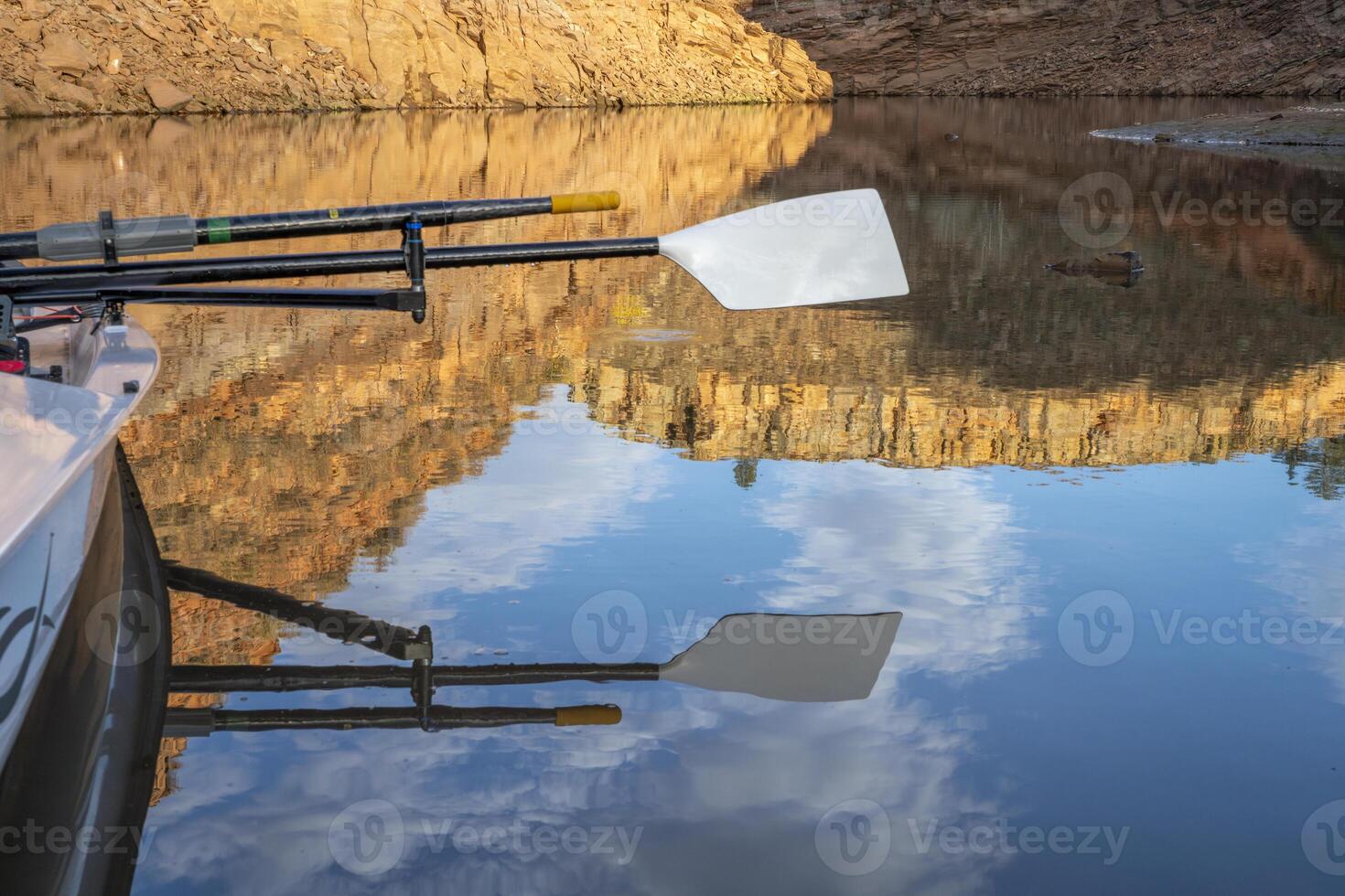 oars of coastal sculling shell in sandstone canyon of Horsetooth Reservoir in Colorado in fall scenery photo