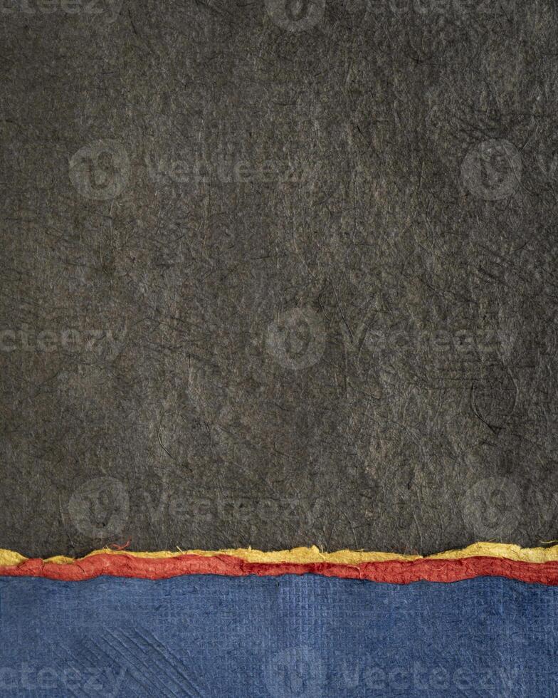 vivid abstract paper landscape in vertical format - collection of handmade textured art papers photo