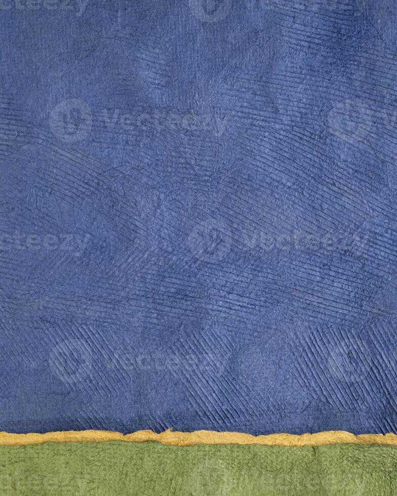 vivid abstract paper landscape in vertical format - collection of handmade textured art papers photo