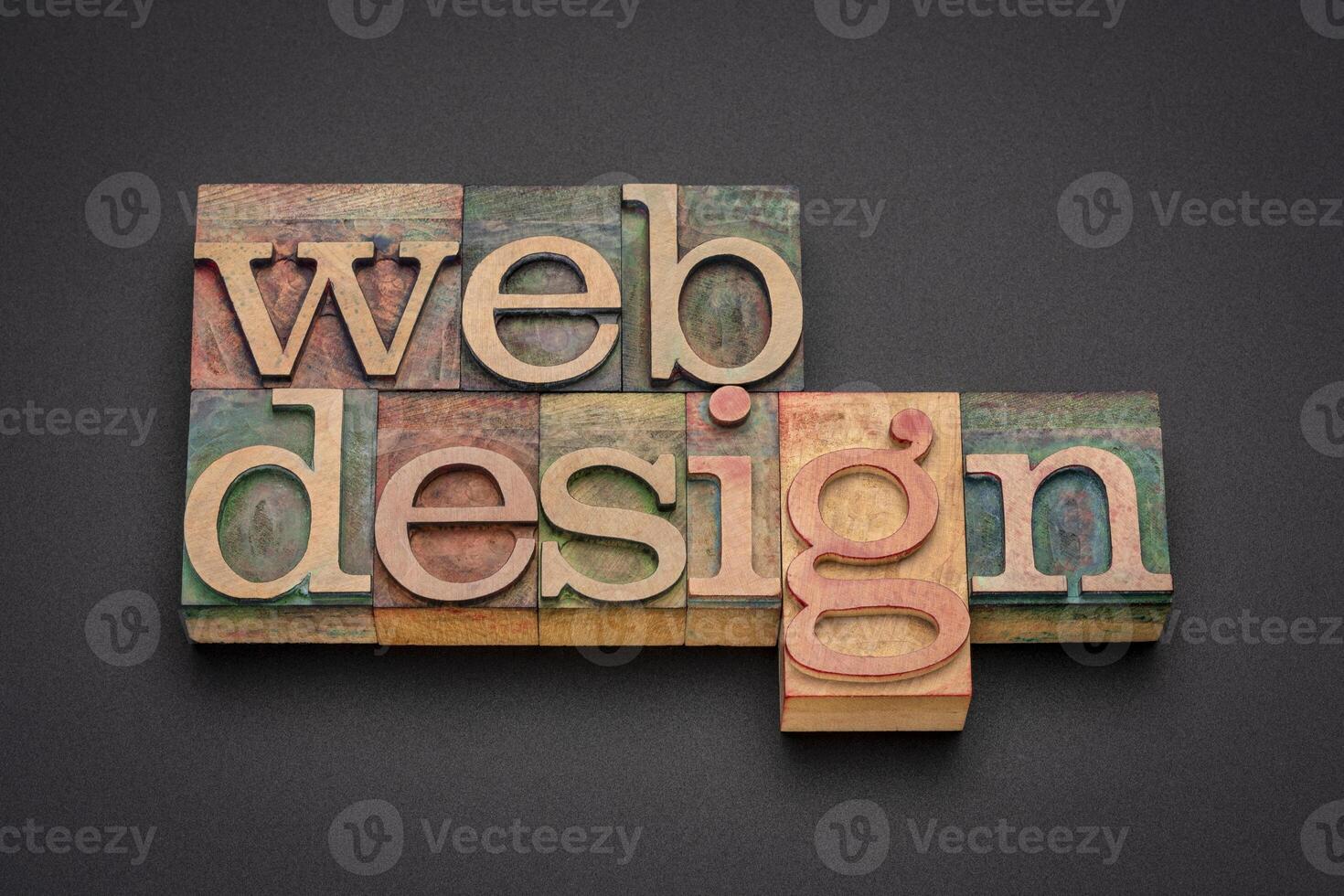 website design word abstract in wood type photo