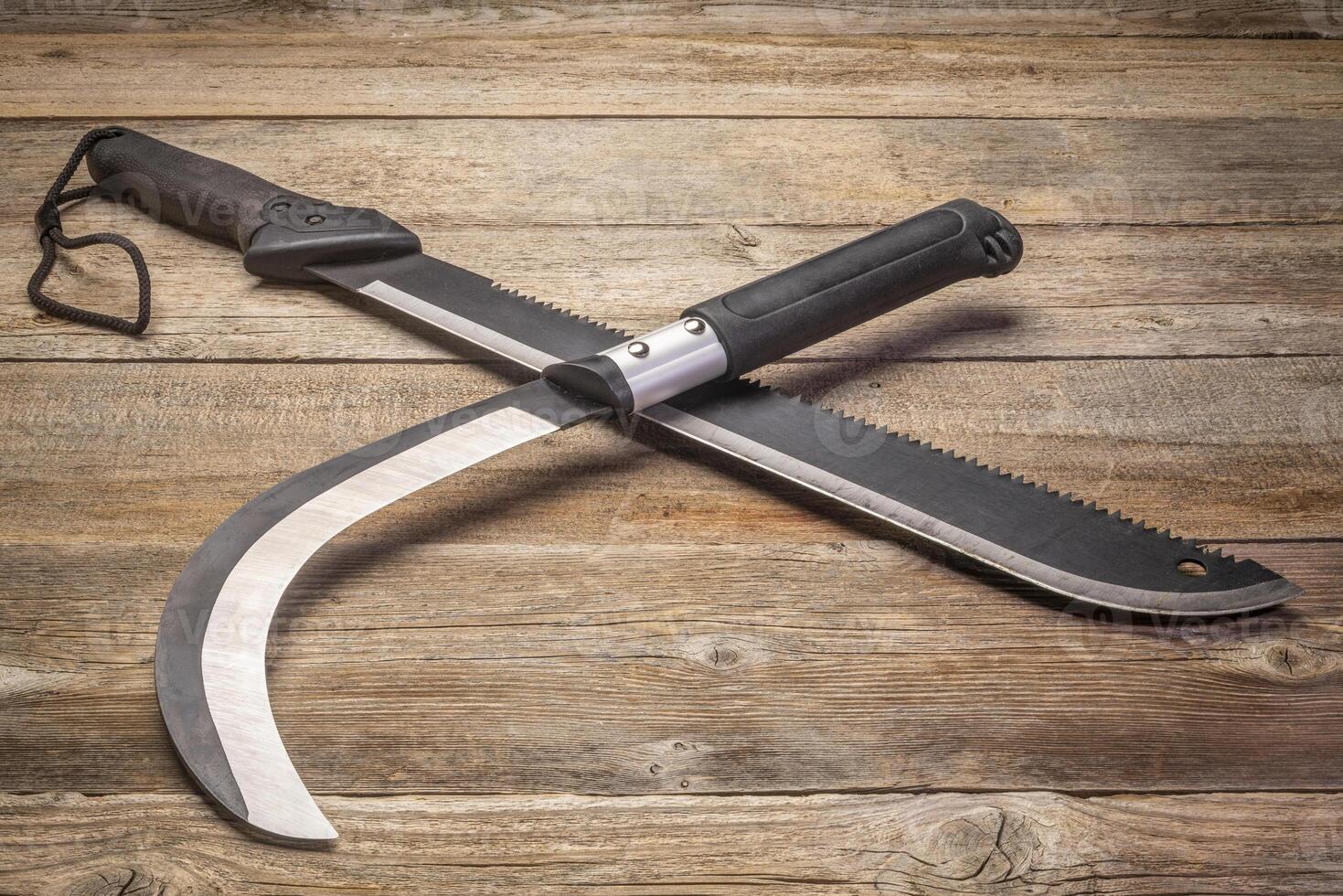 bush clearing sickle and machete photo