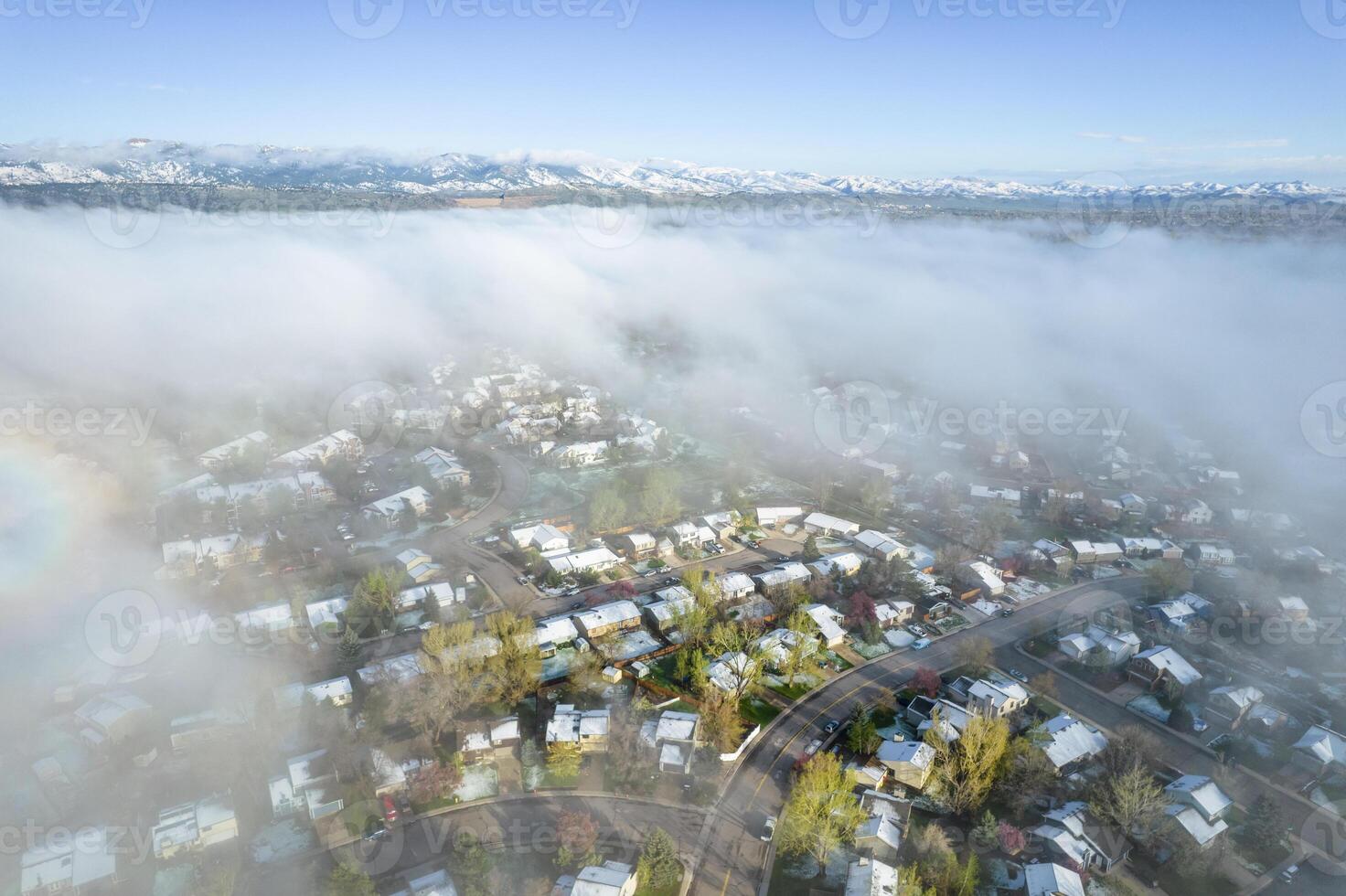 foggy spring morning over residential area of Fort Collins photo