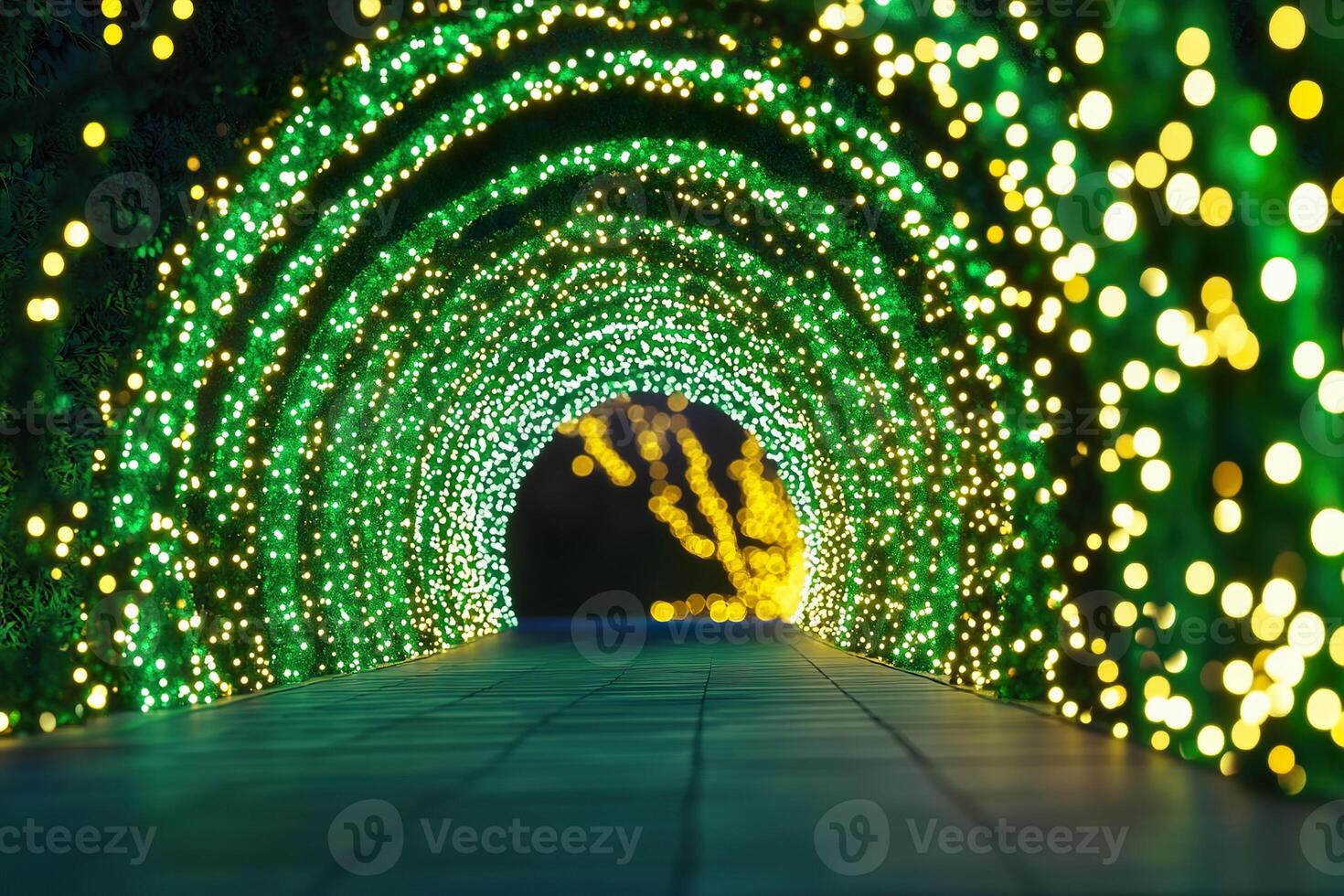 Enchanting illuminated tunnel creating magical Christmas atmosphere for evening strolls. photo