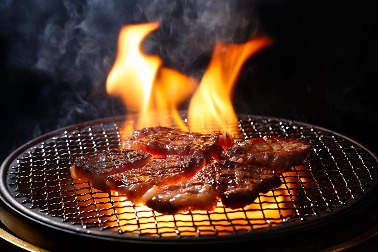 Grilled meat on a grill with flames photo