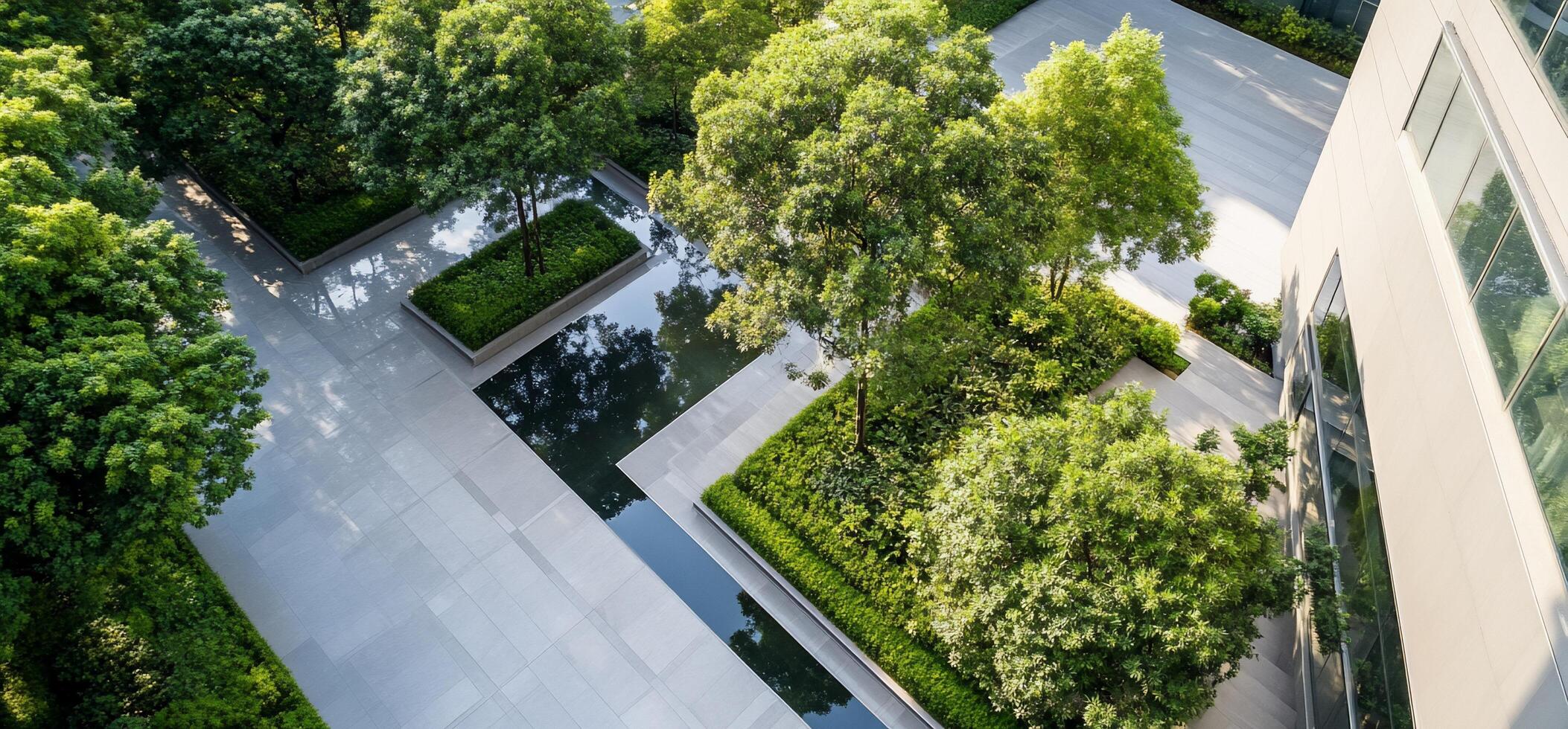 Aerial view of a landscaped area with greenery and water features. photo