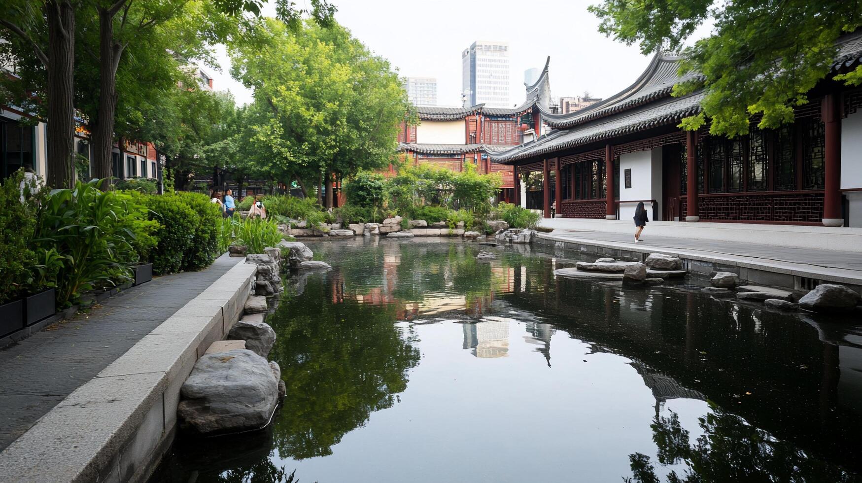 Tranquil garden scene with a pond and traditional architecture. photo