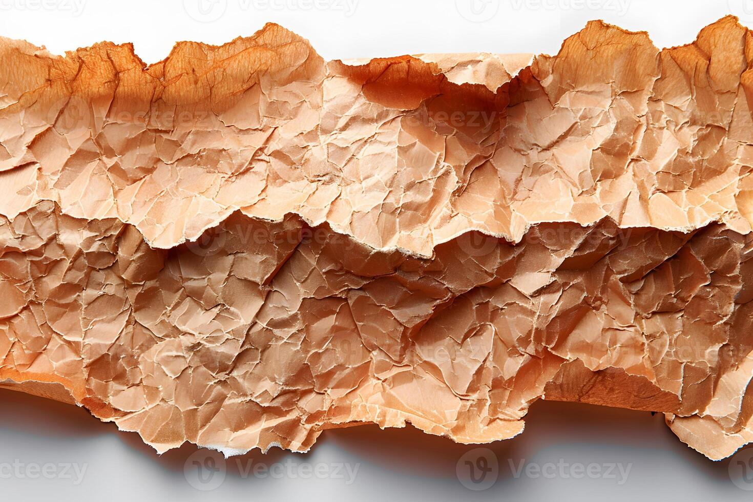 Textured Abstract Close-Up of Layered Torn Brown Paper Surface for Artistic Design photo