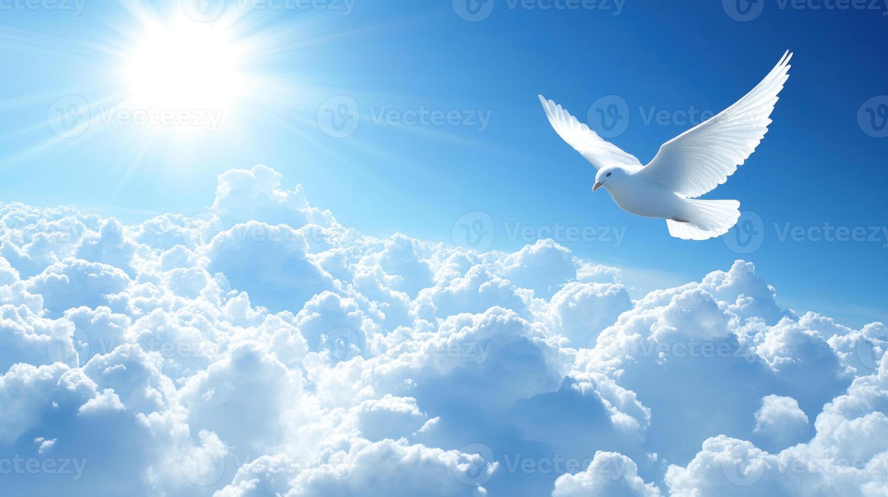 A dove glides gracefully above soft clouds, basking in the warmth of the sun on a clear blue day photo