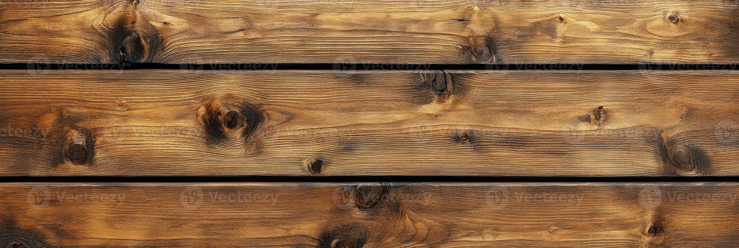 Rustic wooden planks with distinct grain patterns and knots glow in soft, warm light highlighting their unique texture photo