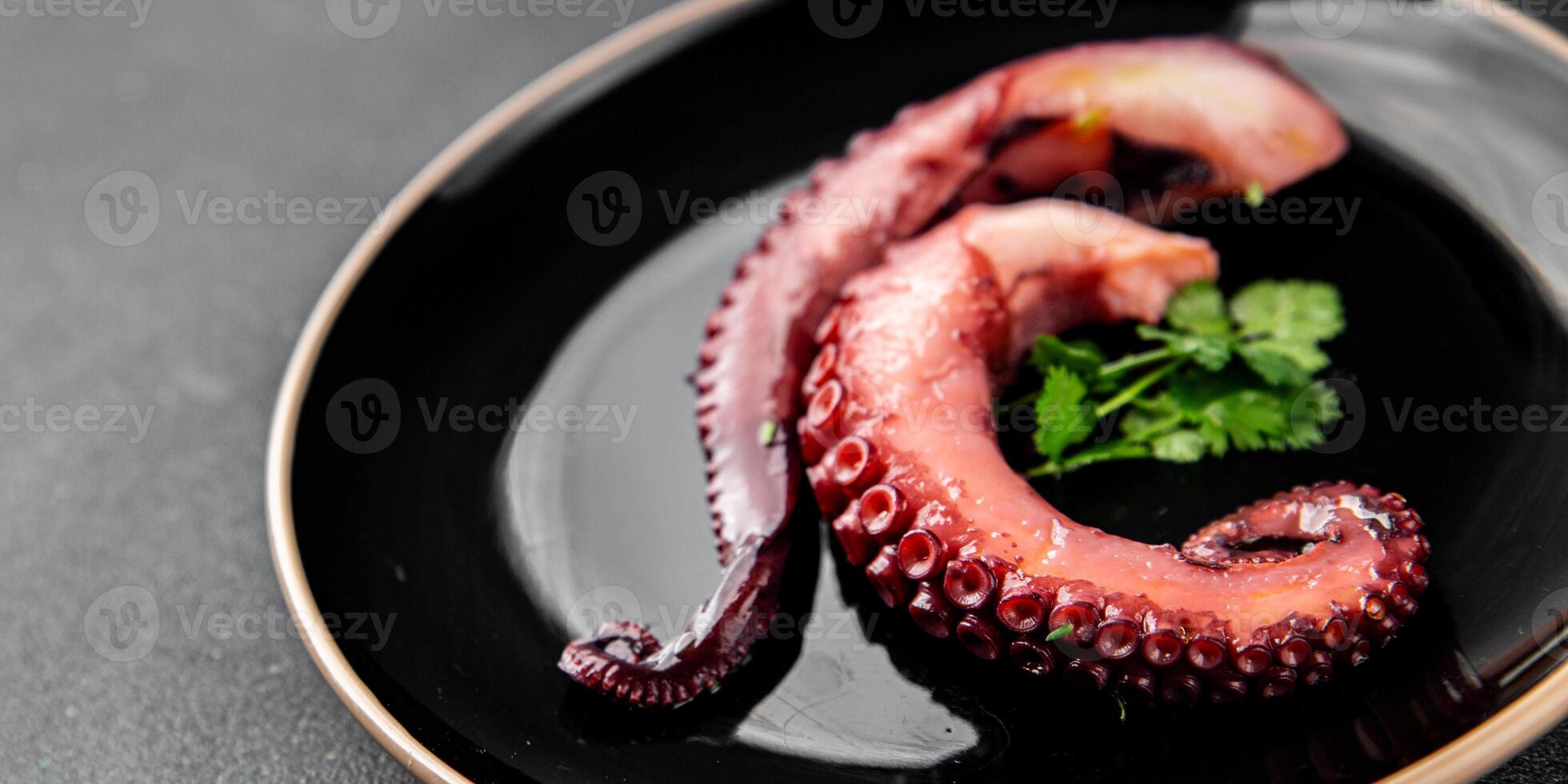 Octopus food seafood octopus tentacles fresh tasty food dish pescetarianism delicious gourmet food background on the table rustic food top view copy space keto and paleo diet photo