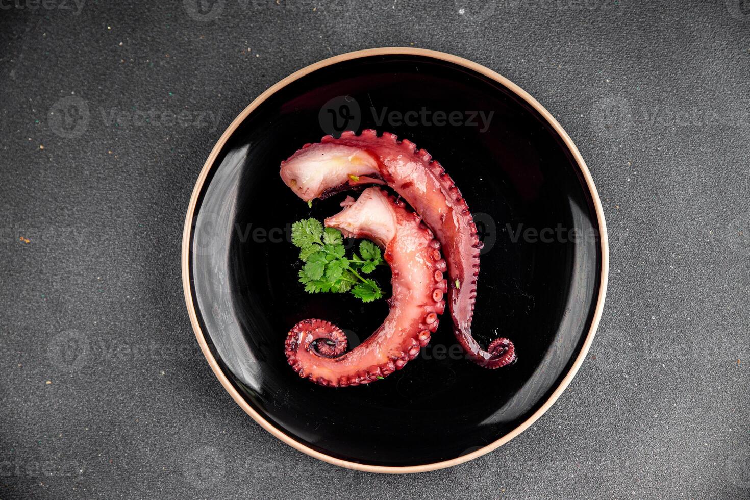 Octopus food seafood octopus tentacles fresh tasty food dish pescetarianism delicious gourmet food background on the table rustic food top view copy space keto and paleo diet photo