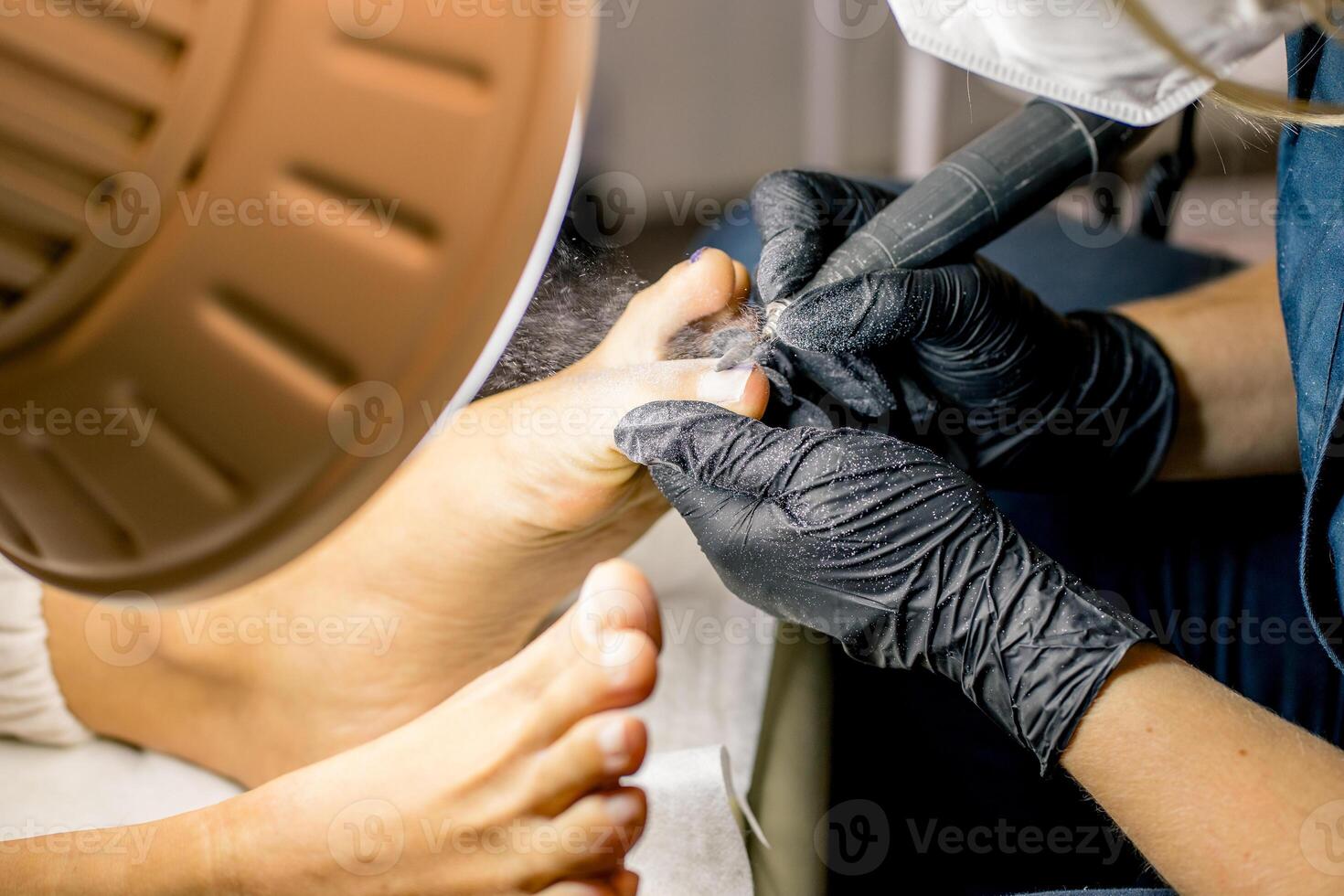 View of the process of a pedicure performed by a master photo