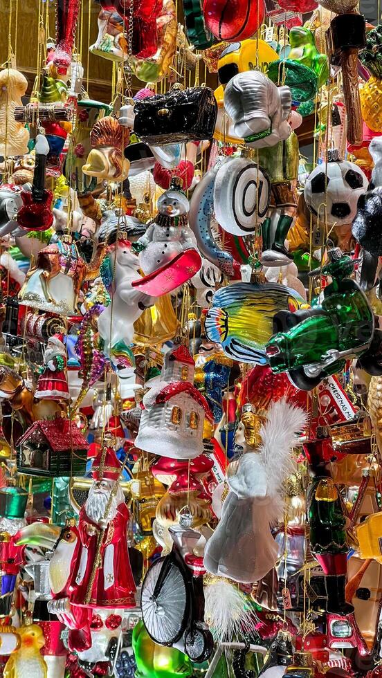 Lots of different Christmas tree decorations. Hanging Christmas tree decorations photo