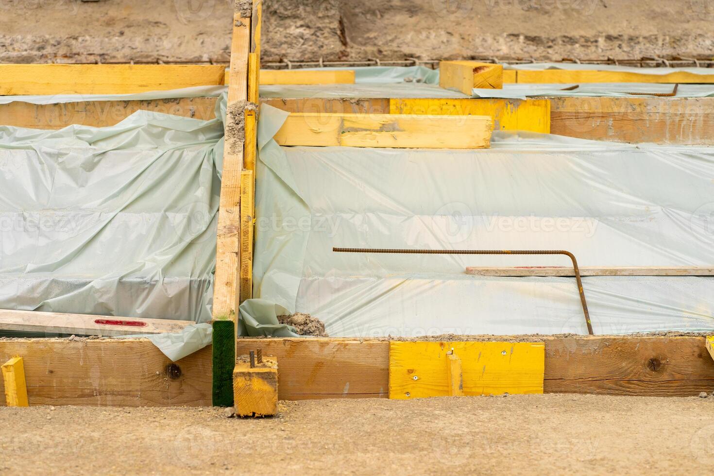 View of the construction and repair of steps near the building photo