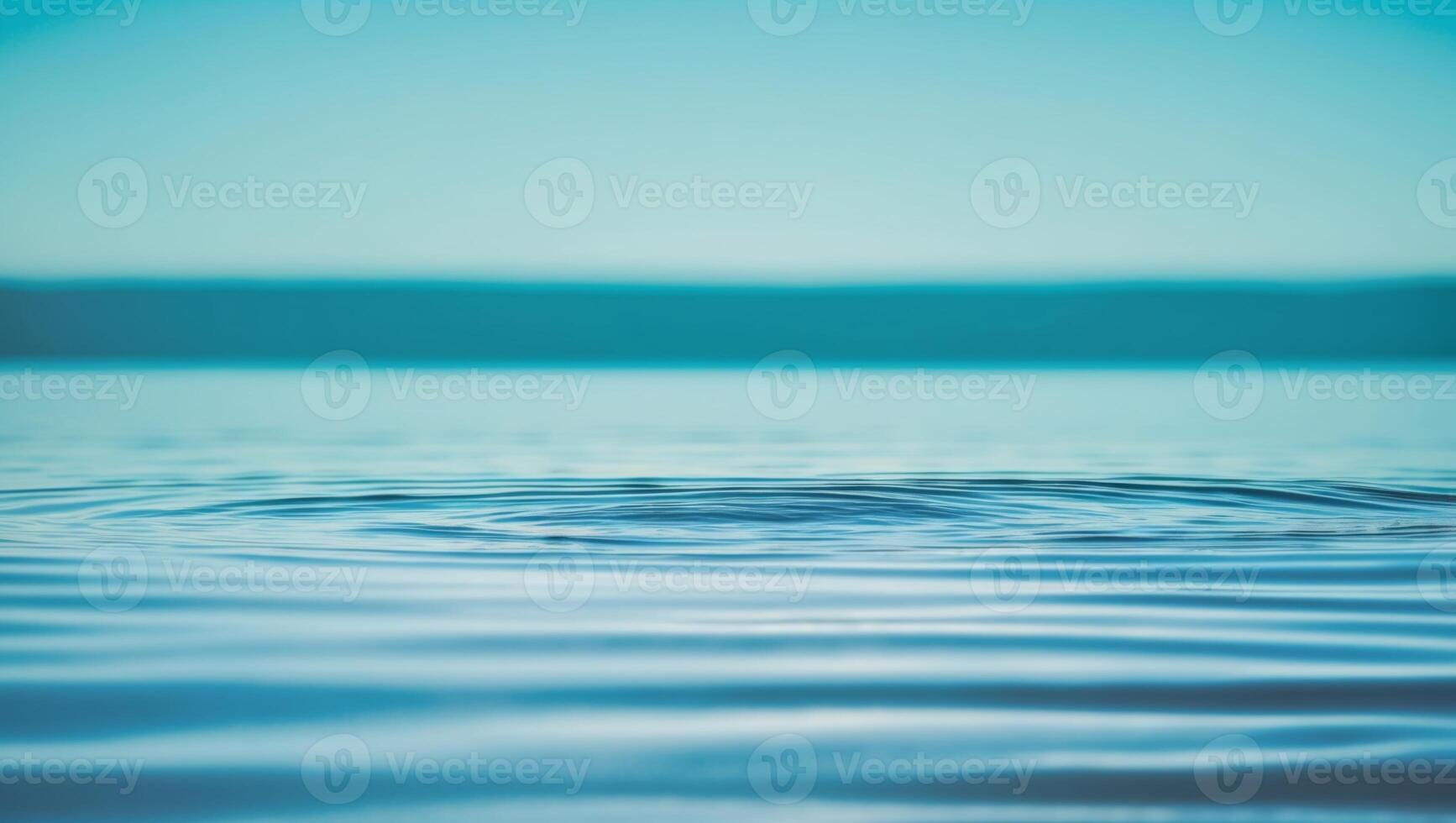 A wave is seen in the water with a blue sky photo