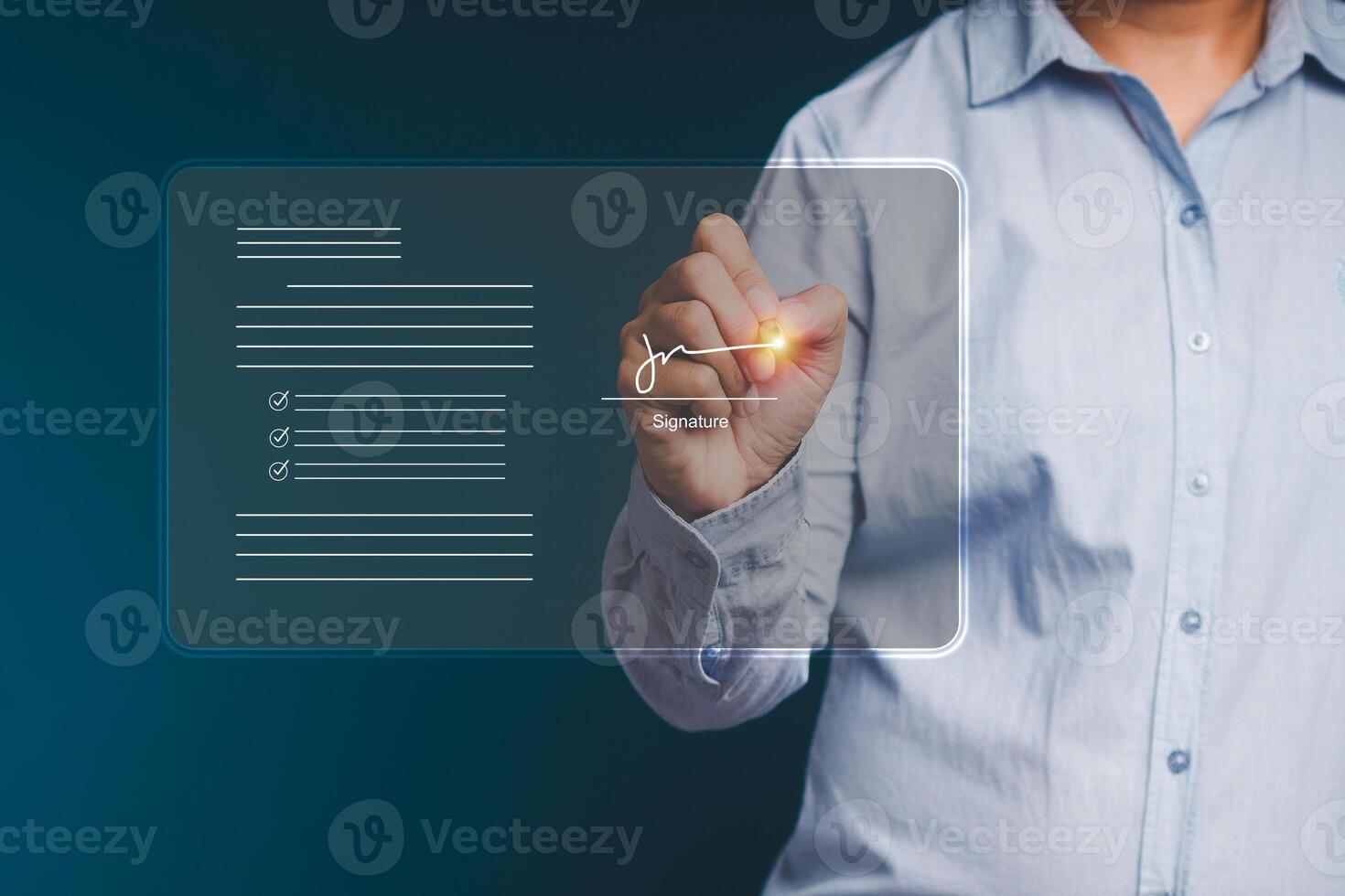 Electronic signature concept. A businessman uses a pen to sign electronic documents on digital documents on a virtual screen photo