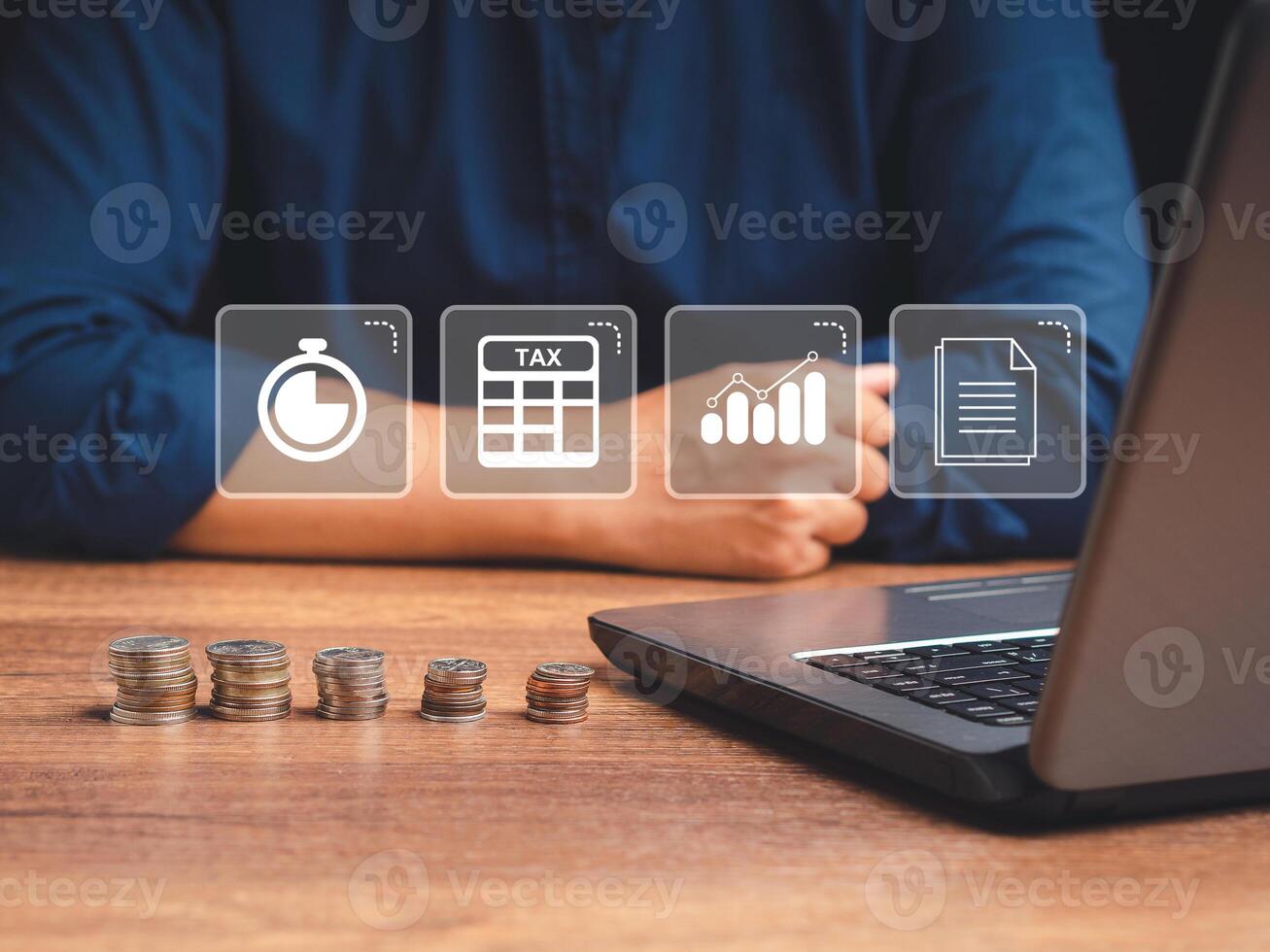 Businessman using a laptop to complete individual income tax return form online for tax payment photo