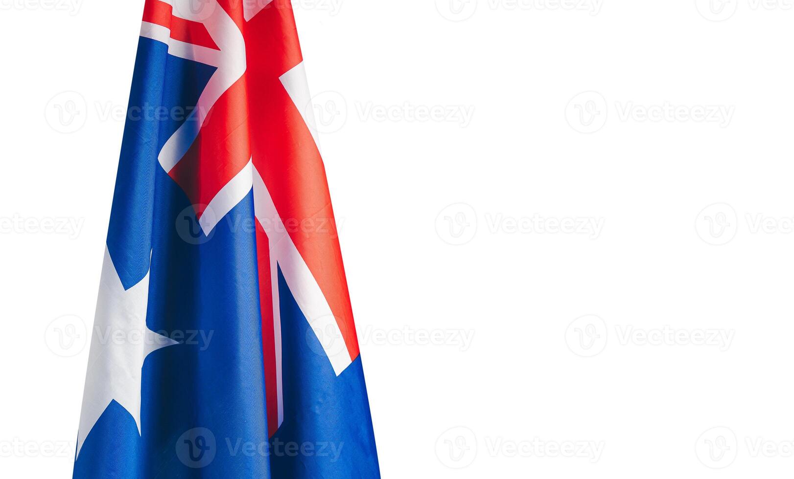Close-up of the Australian flag is on the left side on a white background photo