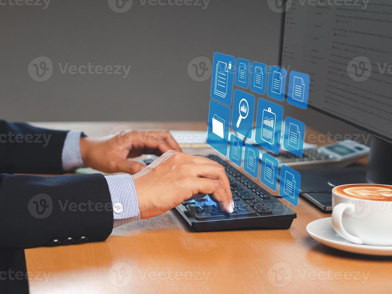 Businessman sitting working at digital documents on a virtual screen in the office photo