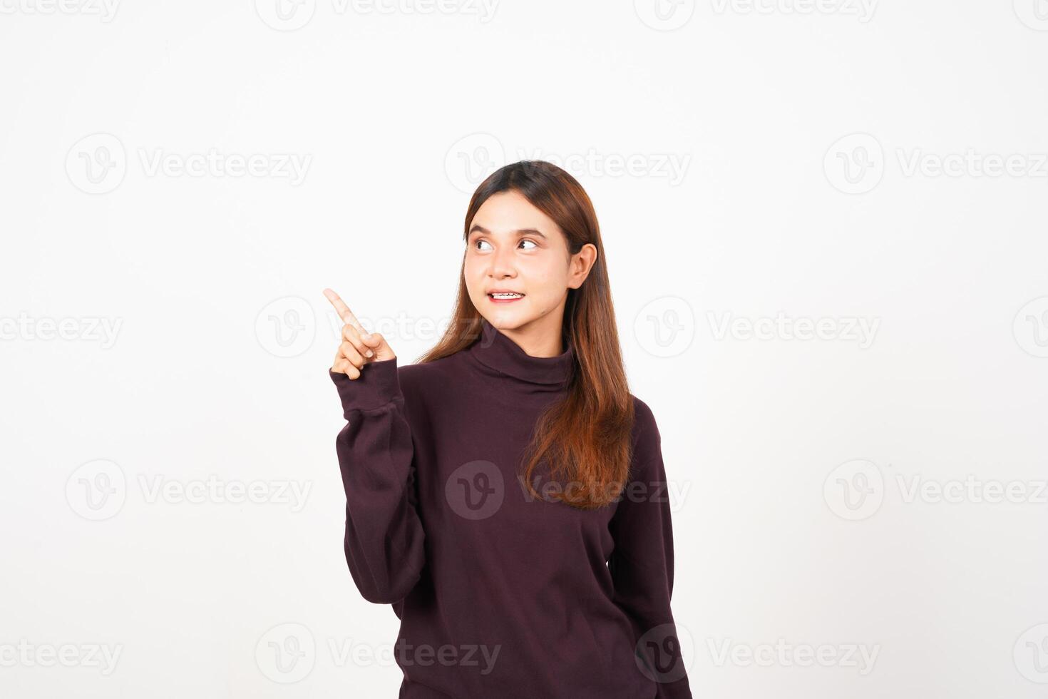 Smiling and Pointing side copy space showing advertising Of Beautiful Asian Woman Isolated On White Background photo