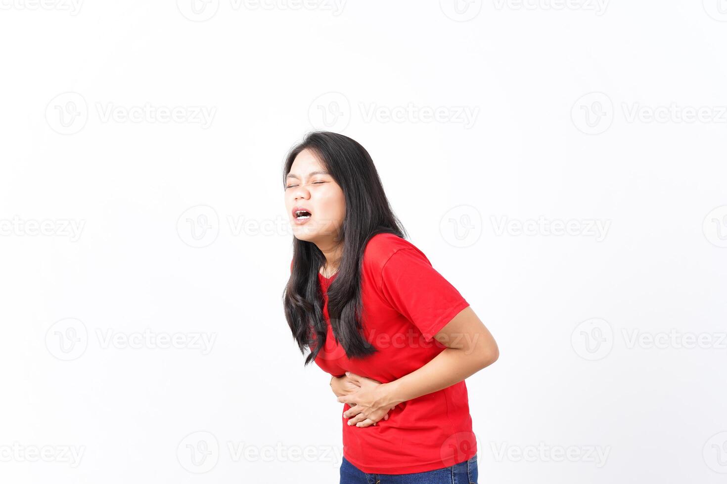 Hand on Stomach suffering Stomachache, Pain on Stomach Of Beautiful Asian Woman wearing red shirt Isolated On White Background photo