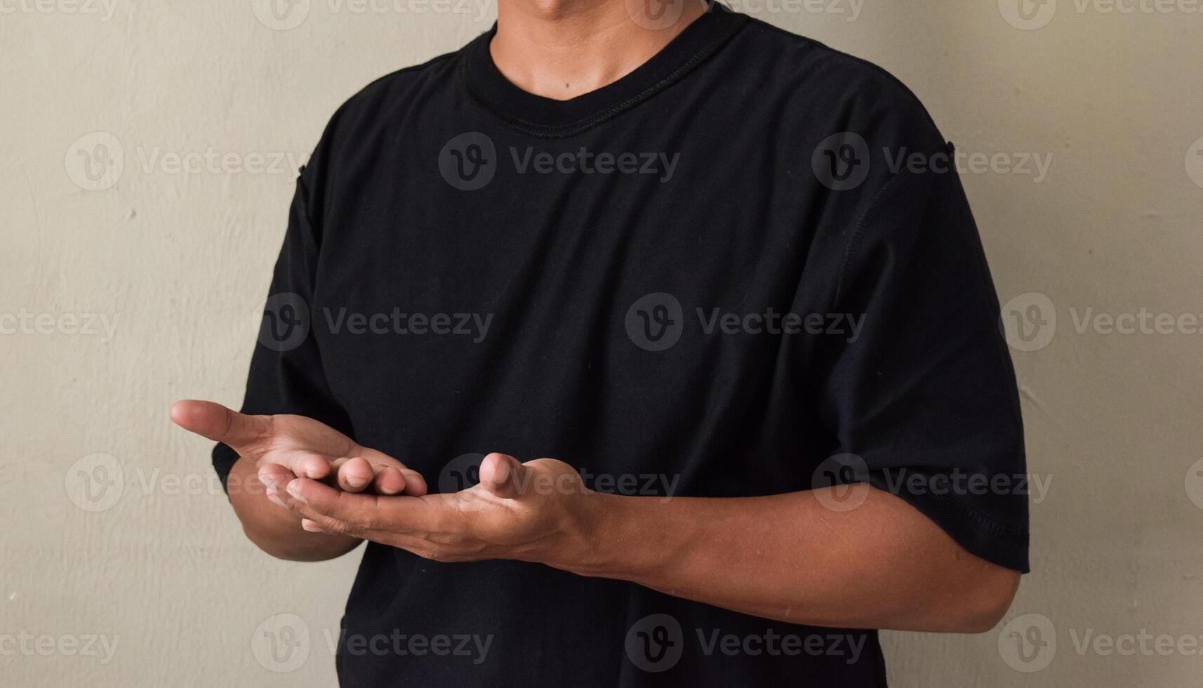 Sign language with hand gestures speaking body language with young man photo