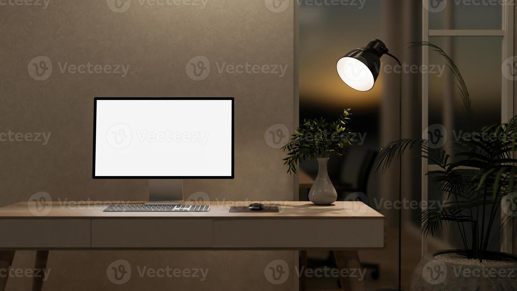 A modern, cozy office at night, featuring a computer with a white screen mockup on a table. photo