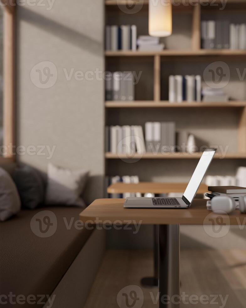 A side view of a laptop on a wooden table in a cozy contemporary coffee shop or library. photo
