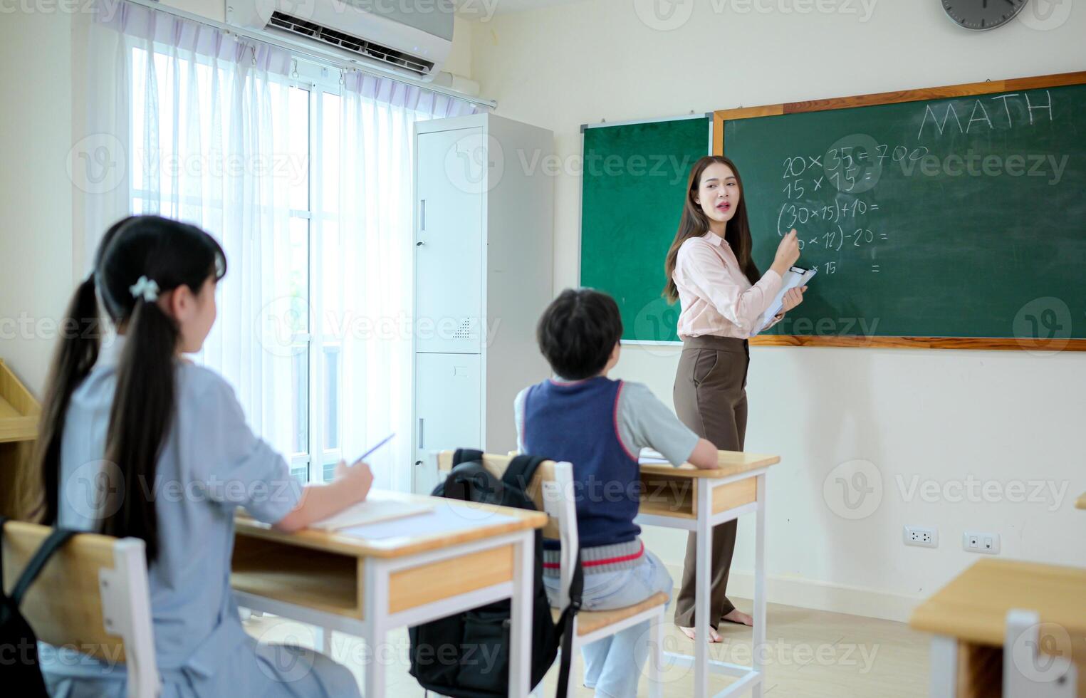 STEM lesson, Teacher and students in mathematics classroom photo