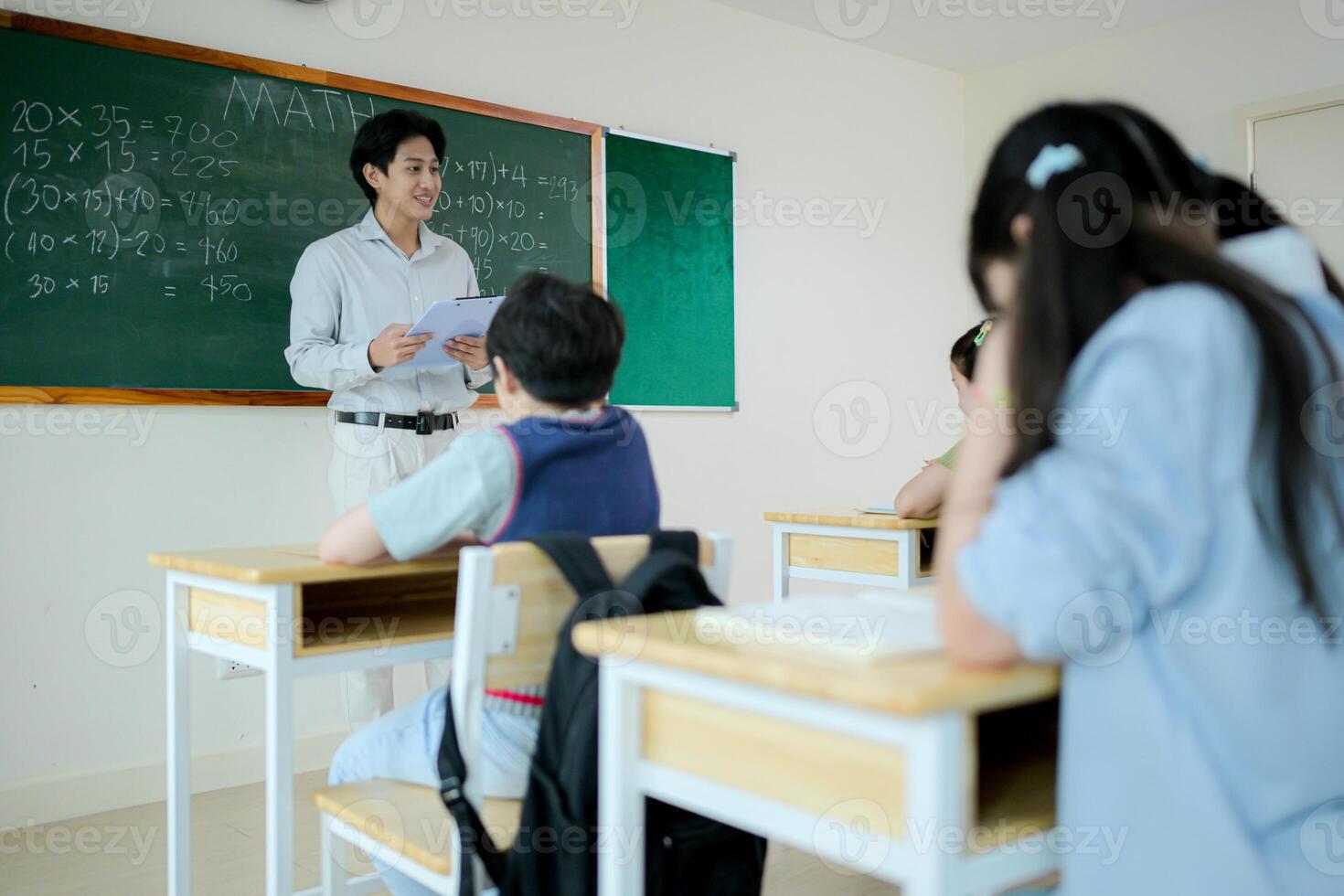 STEM lesson, Teacher and students in mathematics classroom photo