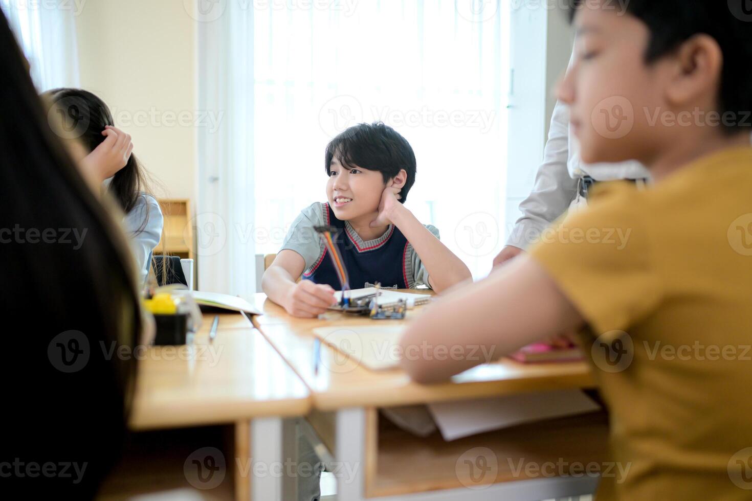 STEM Class, Teacher and students in basic engineering classroom photo