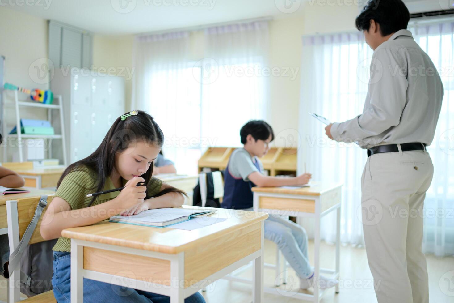 STEM lesson, Teacher and students in mathematics classroom photo