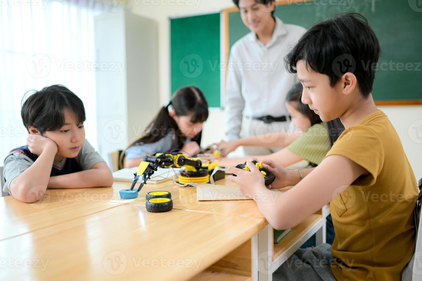 STEM Class, Teacher and students in basic engineering classroom photo