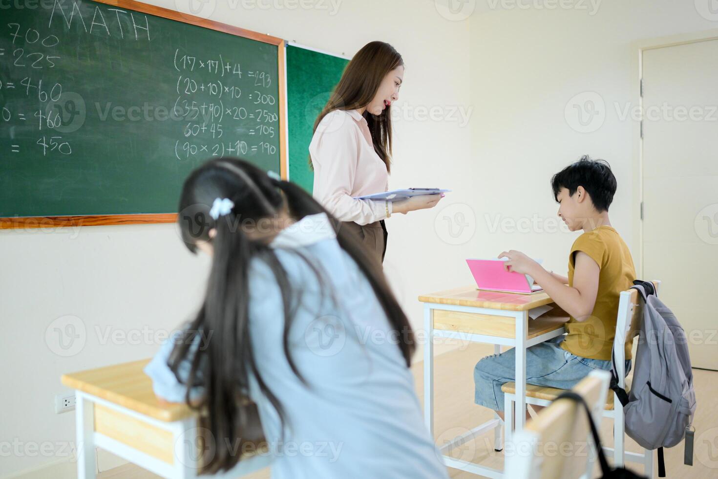 STEM lesson, Teacher and students in mathematics classroom photo