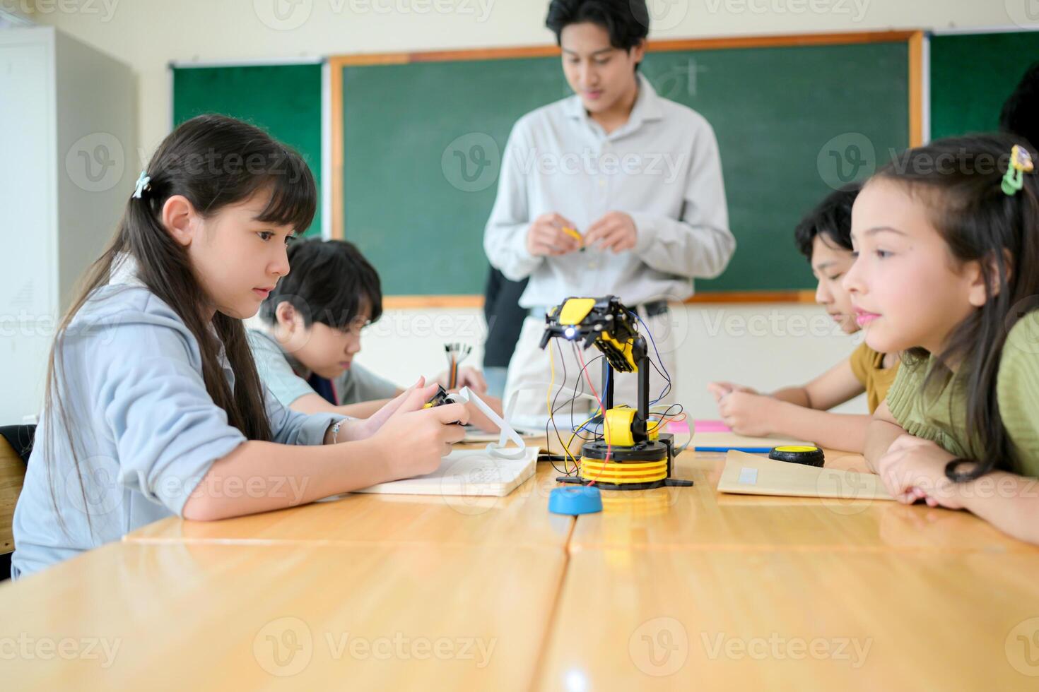 STEM Class, Teacher and students in basic engineering classroom photo