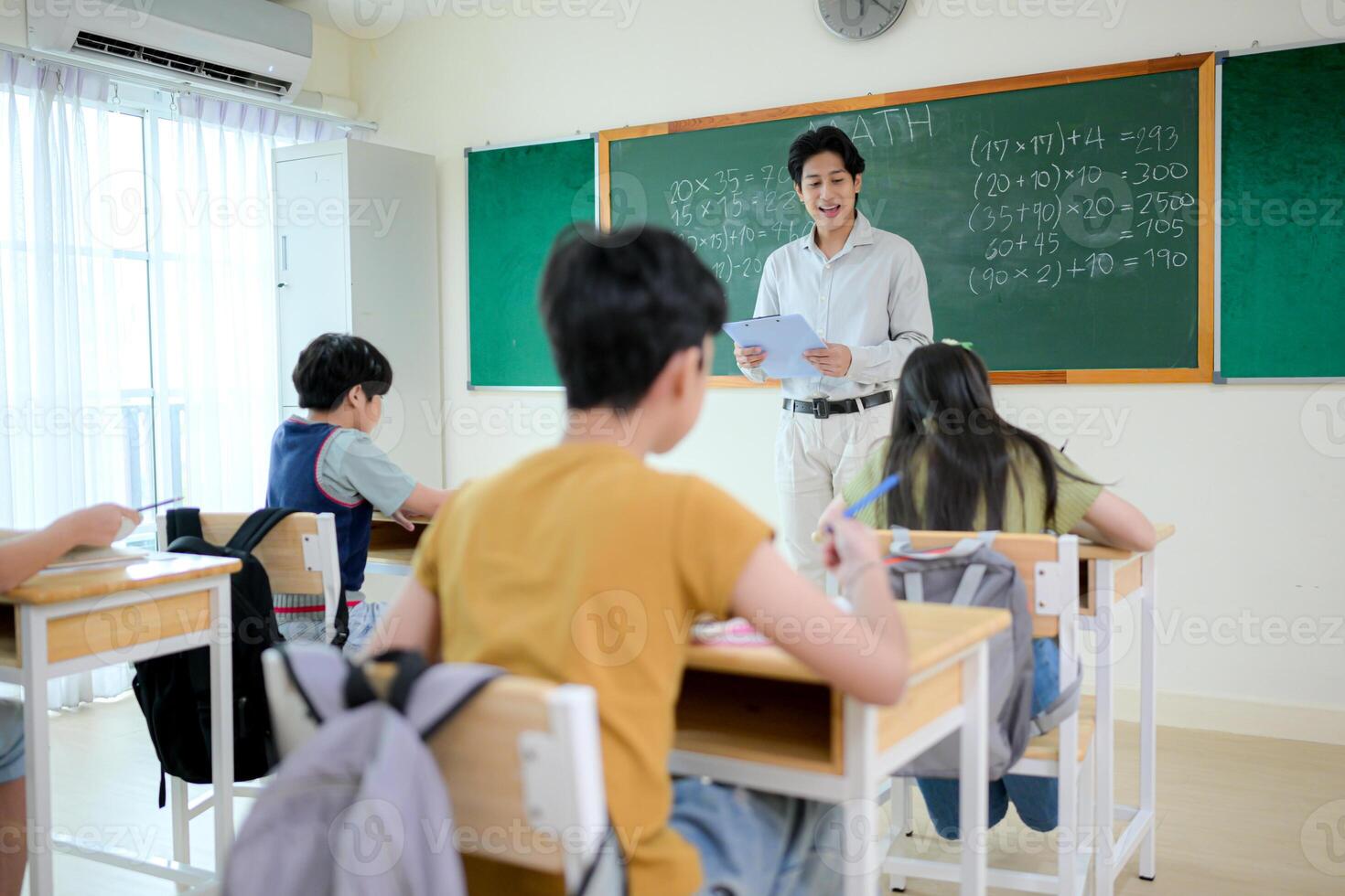 STEM lesson, Teacher and students in mathematics classroom photo