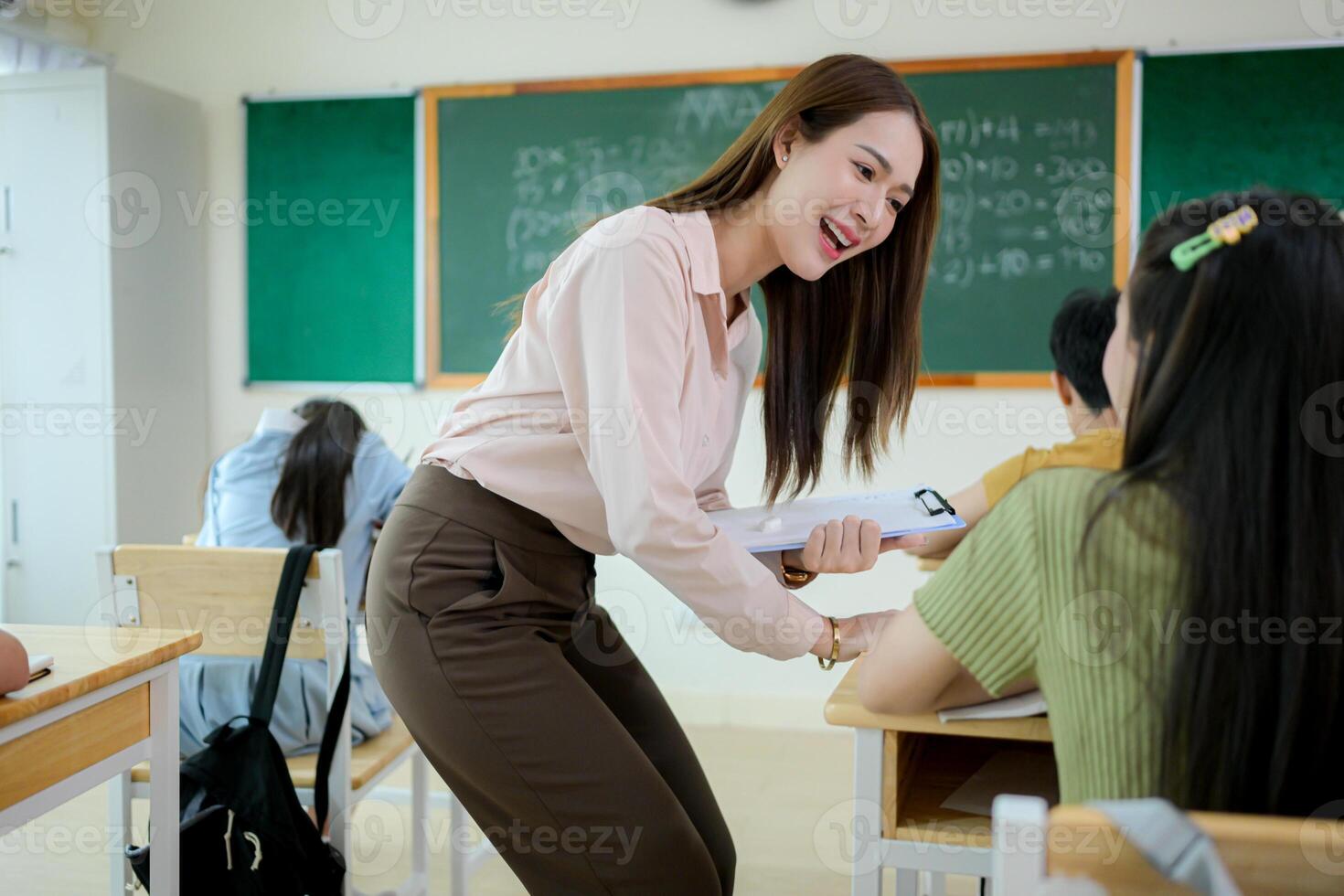 STEM lesson, Teacher and students in mathematics classroom photo