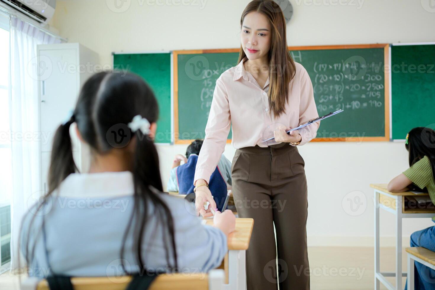 STEM lesson, Teacher and students in mathematics classroom photo