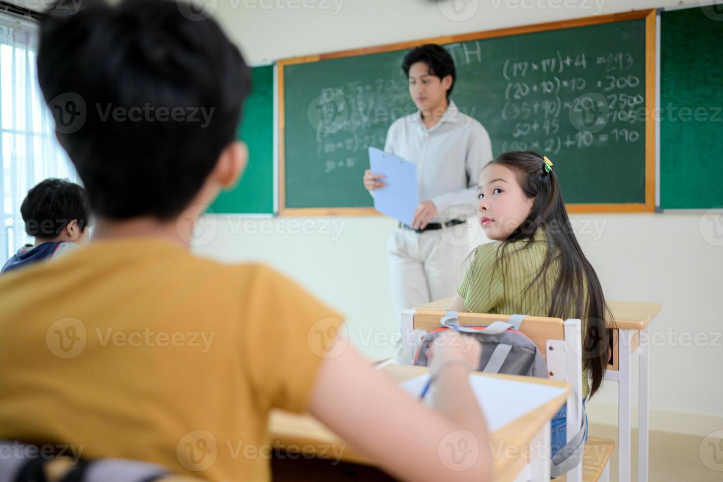 STEM lesson, Teacher and students in mathematics classroom photo