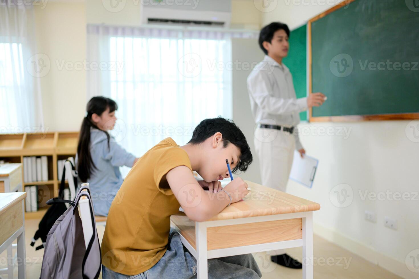 STEM lesson, Teacher and students in mathematics classroom photo