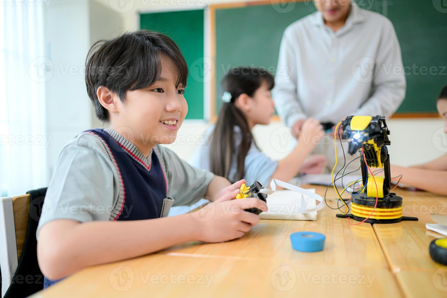 STEM Class, Teacher and students in basic engineering classroom photo