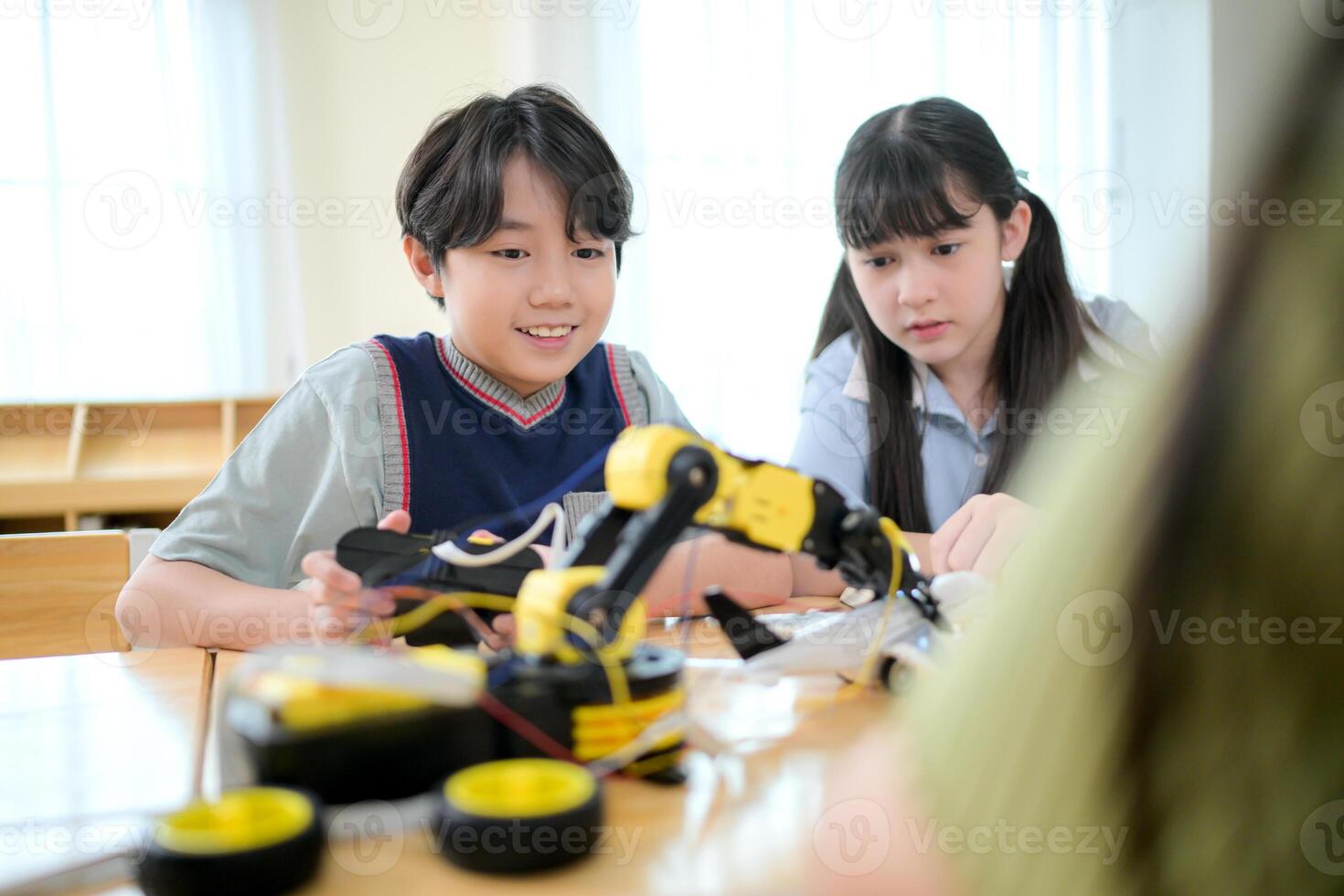 STEM Class, Teacher and students in basic engineering classroom photo