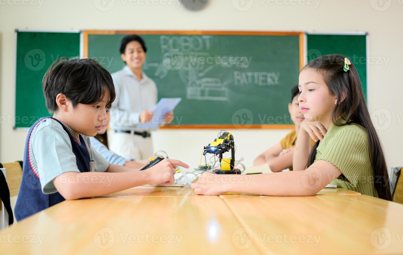 STEM Class, Teacher and students in basic engineering classroom photo