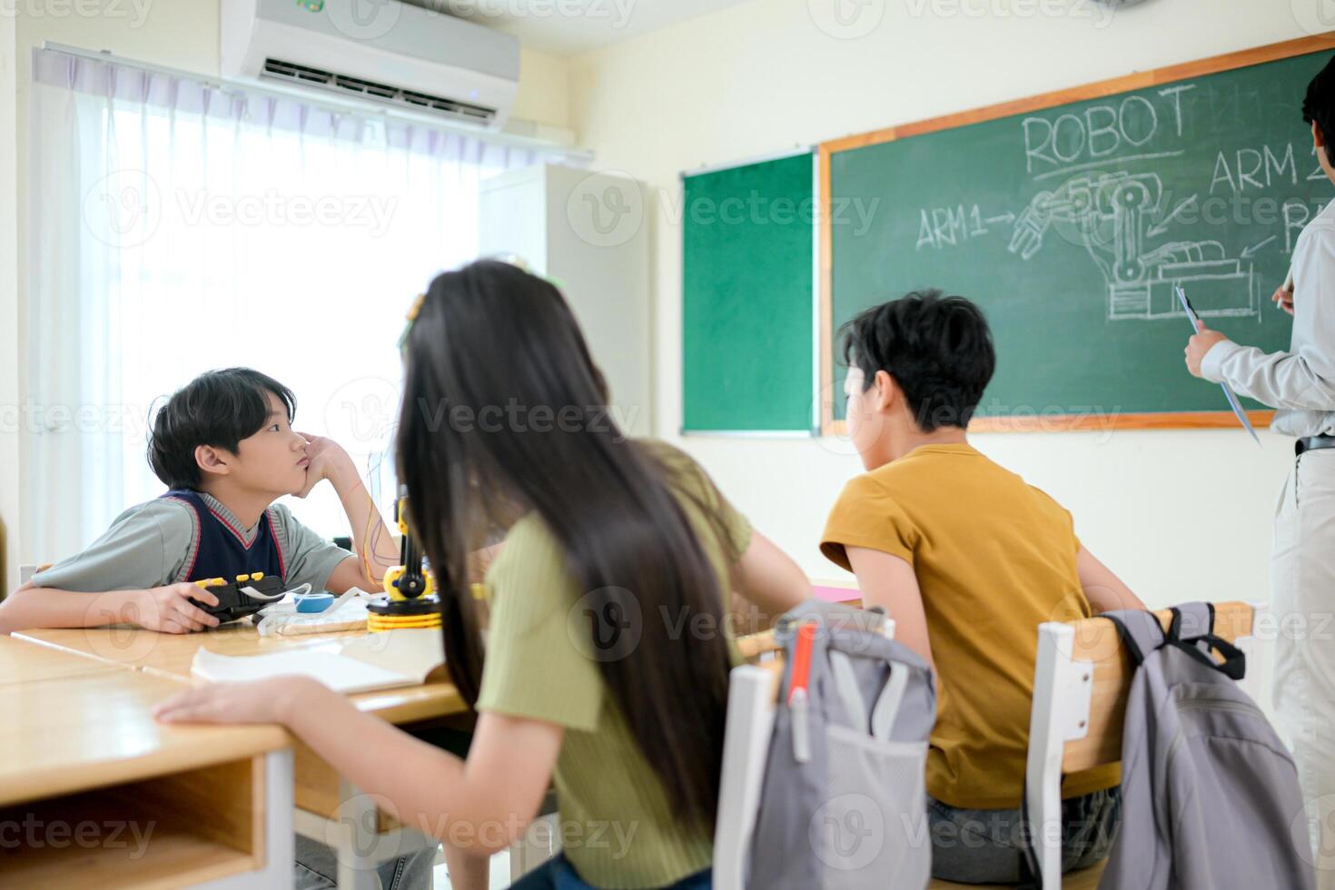 STEM Class, Teacher and students in basic engineering classroom photo